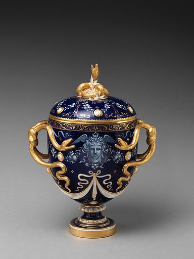Lidded vase with Medusa decoration and snake handles