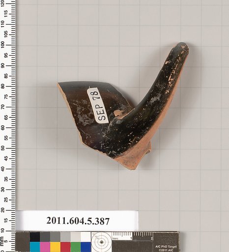 Terracotta rim fragment of a kylix (drinking cup)