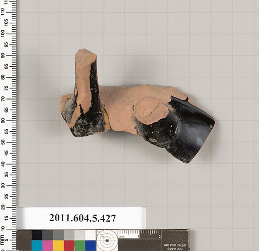 Terracotta fragment of a kylix (drinking cup)