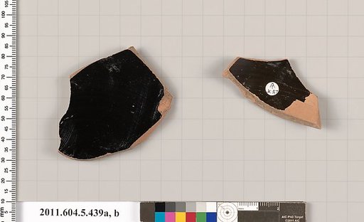 Terracotta fragments of kylikes (drinking cups)