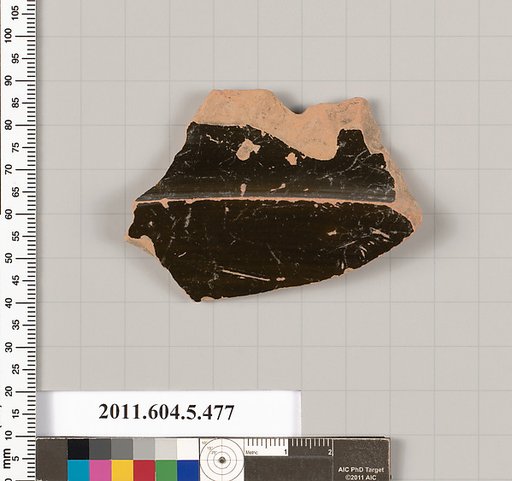 Terracotta fragment of a kylix (drinking cup)