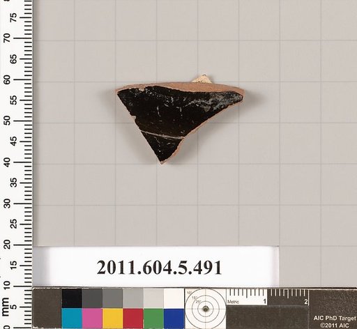 Terracotta fragment of a kylix (drinking cup)