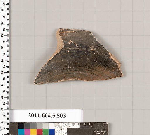 Terracotta fragment of a kylix (drinking cup)