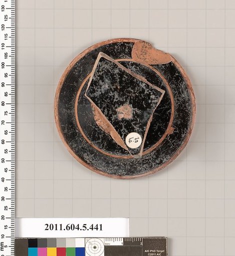 Terracotta fragment of a kylix (drinking cup)