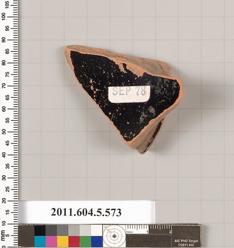 Terracotta fragment of a stemless kylix (drinking cup)