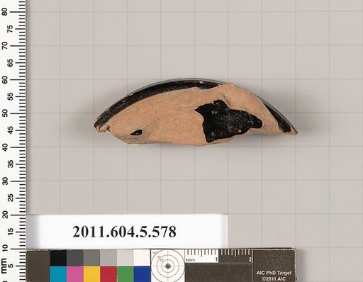 Terracotta fragment of a stemless kylix (drinking cup)