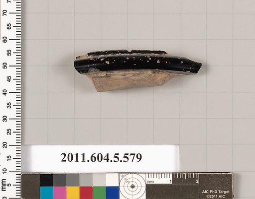 Terracotta fragment of a stemless kylix (drinking cup)