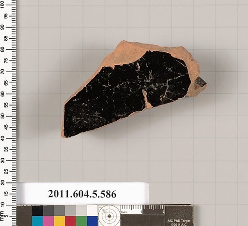 Terracotta fragment of a stemless kylix (drinking cup)