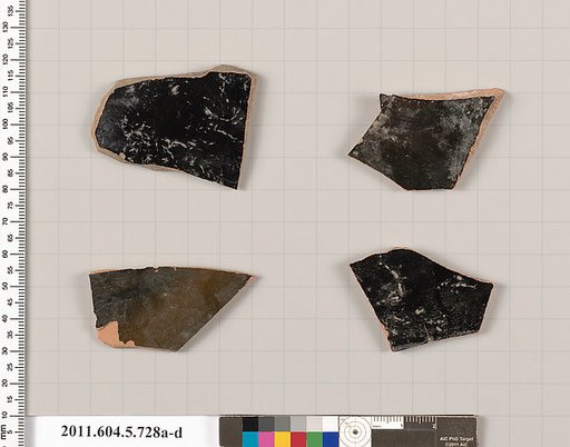 Terracotta fragments of kylikes (drinking cups)