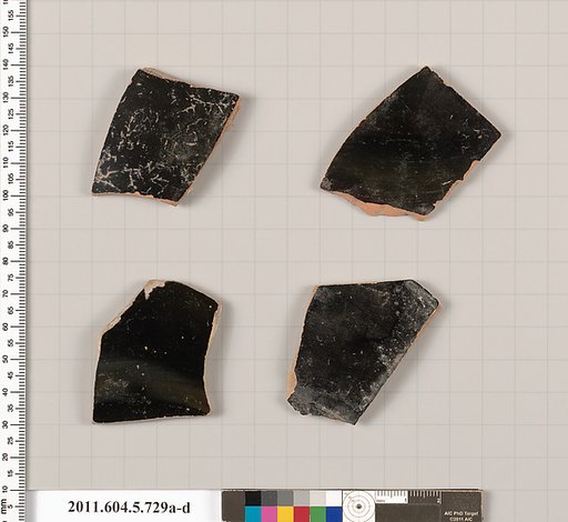 Terracotta fragments of kylikes (drinking cups)