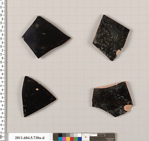 Terracotta fragments of kylikes (drinking cups)