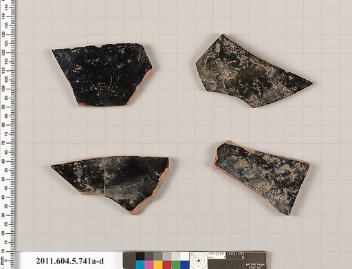 Terracotta fragments of kylikes (drinking cups)