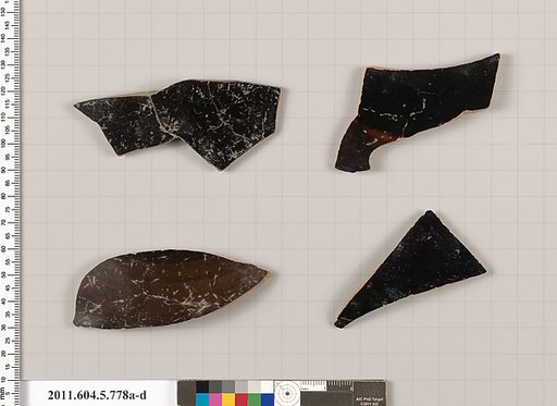 Terracotta fragments of kylikes (drinking cups)