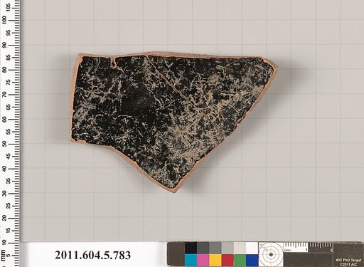 Terracotta fragment of a kylix (drinking cup)