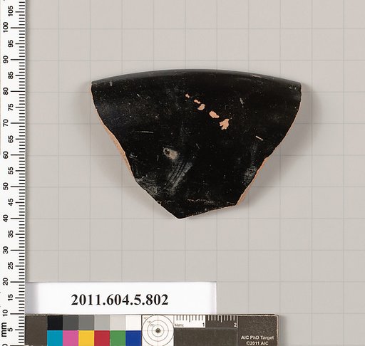 Terracotta rim fragment of a kylix (drinking cup)