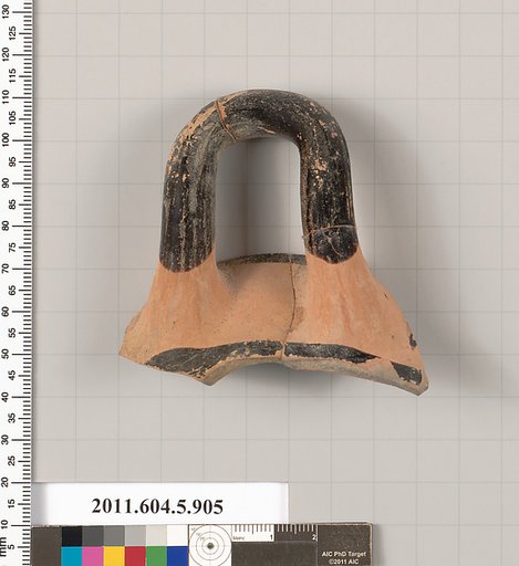 Terracotta fragment of a kylix (drinking cup)