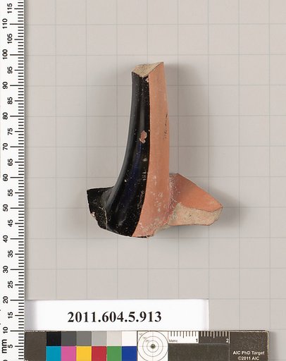 Terracotta fragment of a kylix (drinking cup)