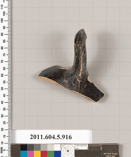 Terracotta fragment of a kylix (drinking cup)