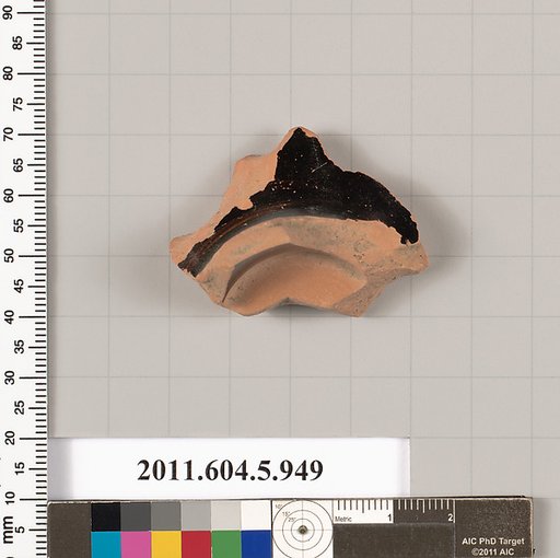 Terracotta fragment of a kylix (drinking cup)