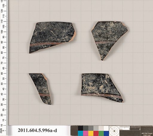 Terracotta rim fragments of a kylix (drinking cup)?