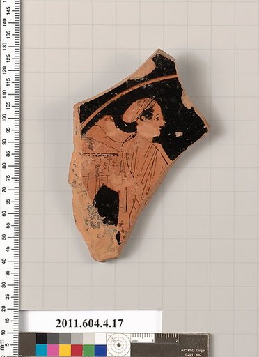 Terracotta fragment of a stemless kylix (drinking cup)