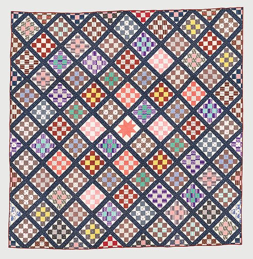 Thirteen-patch block quilt with Japanesque backing fabric