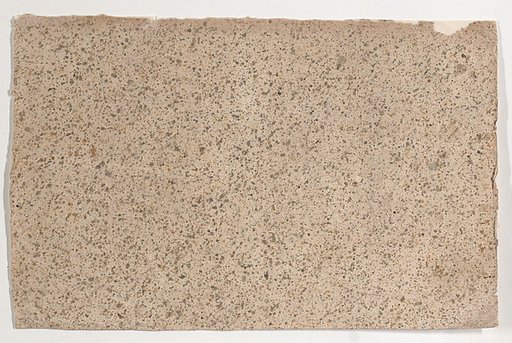 Sheet with an overall brown speckle pattern