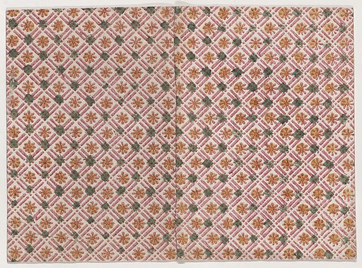 Book cover with geometric and floral pattern in red, yellow, and green