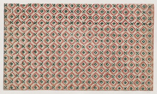 Sheet with overall pattern of squares and crosses