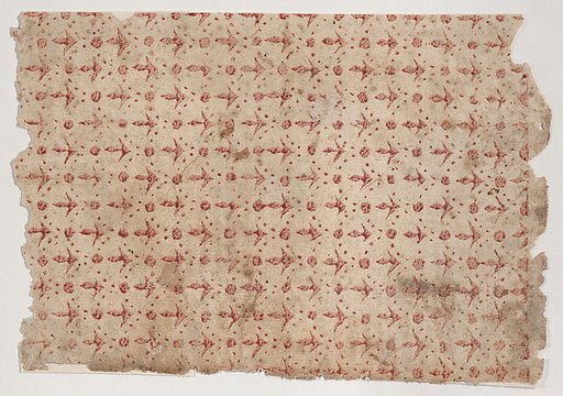 Sheet with overall pattern of dots and arrow shapes