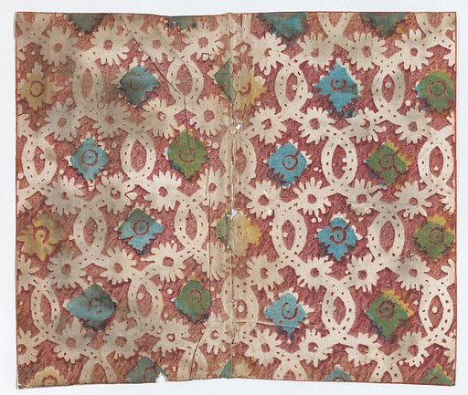 Sheet with overall lattice pattern with rosettes