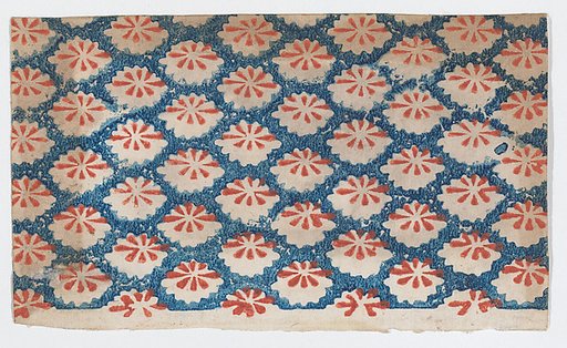 Sheet with overall pattern of ovals with red designs