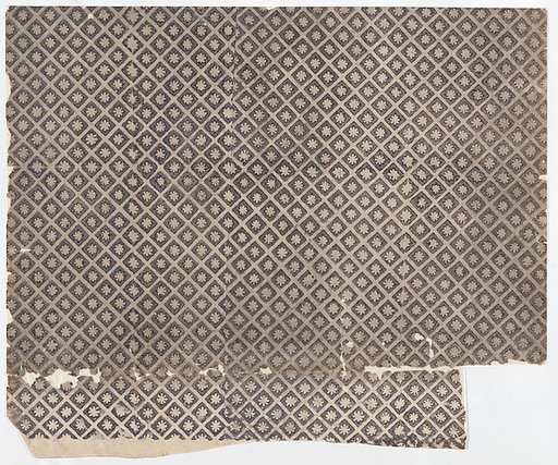 Sheet with overall pattern of flowers within squares