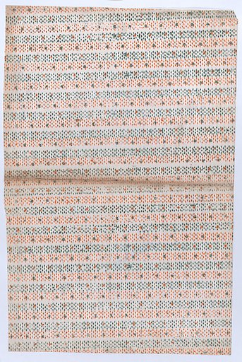 Book cover with overall orange and green dot pattern