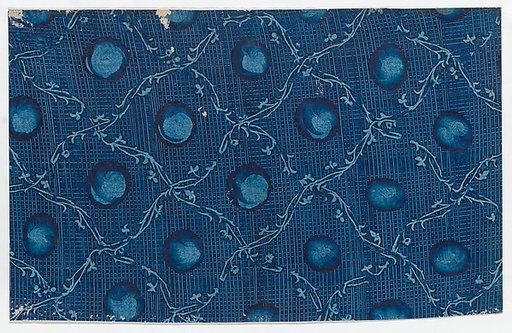 Blue paste paper with circular designs and ornamental diagonal pattern and crisscross background