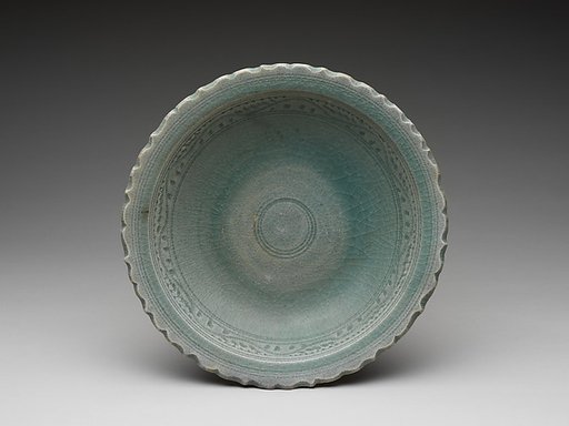 Dish green glazed with foliate rim
