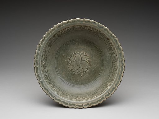 Dish green glazed with floral medallion and foliate rim