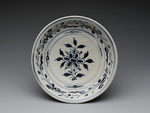 Dish with six-petalled flower design and floral scroll on cavetto