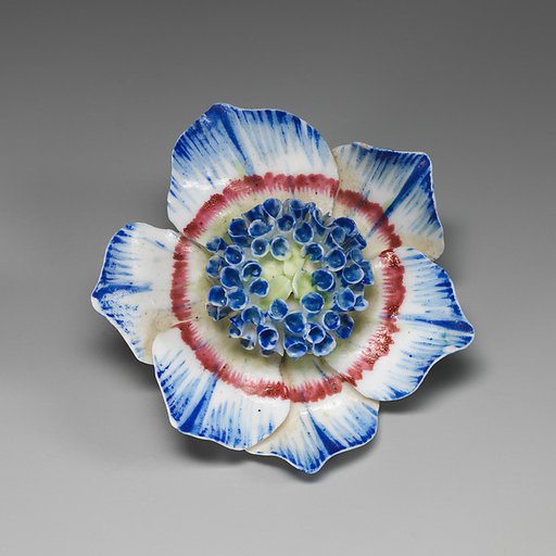 Porcelain flower (one of a set of nine)