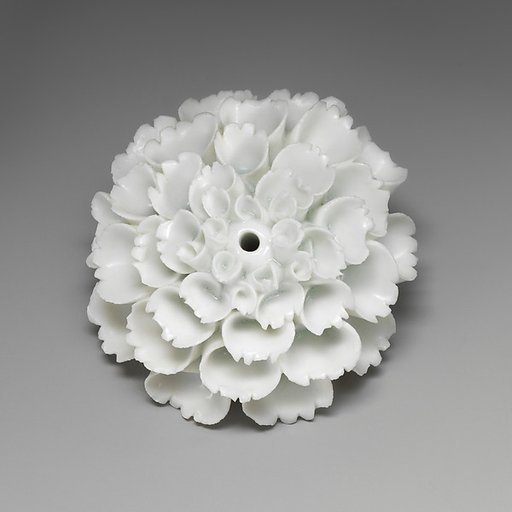 Porcelain flower (one of a set of nine)