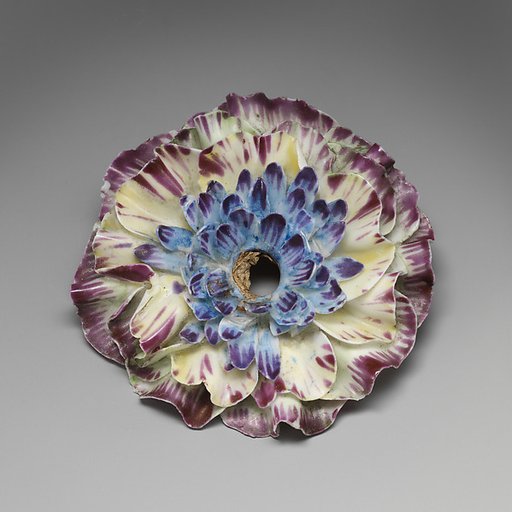 Porcelain flower (one of a set of nine)