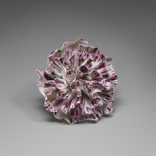 Porcelain flower (one of a set of nine)