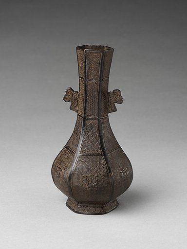 Hexagonal vase with cloud-shaped handles