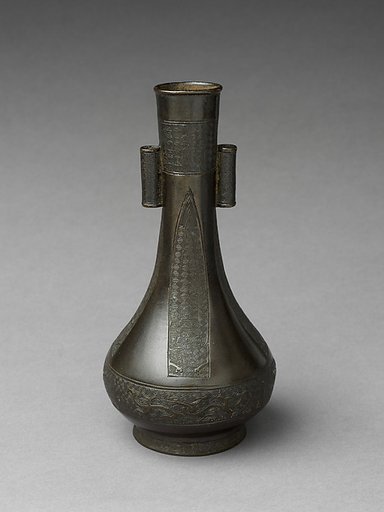 Long neck vase with tubular handles