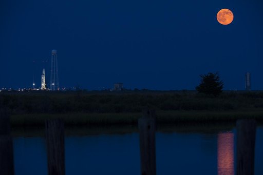 Antares Rocket with Full Moon