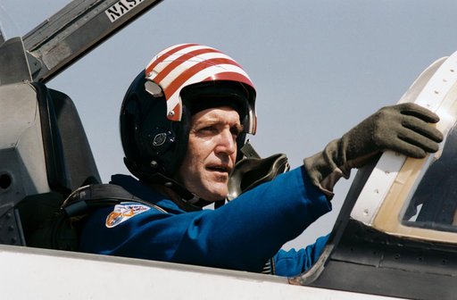 Astronaut Francis R. (Dick) Scobee boards T-38 for trip to KSC