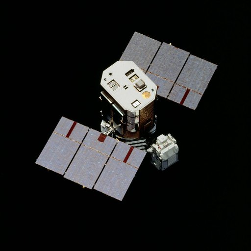 View of the damaged Solar Maximum Mission Satellite from the 41-C Challenger