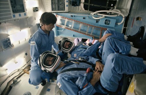 Payload specialists Marc Garneau and Paul Scully-Power in SMS