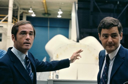 Astronauts Crippen and Payload specialist Garneau in front of SMS