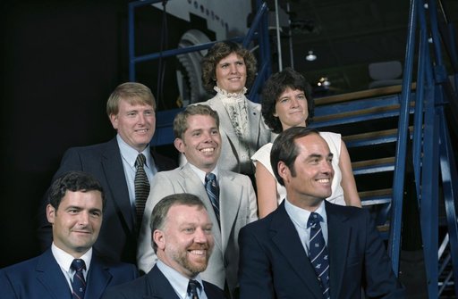 Portrait view of STS 41-G crew in civilian clothes